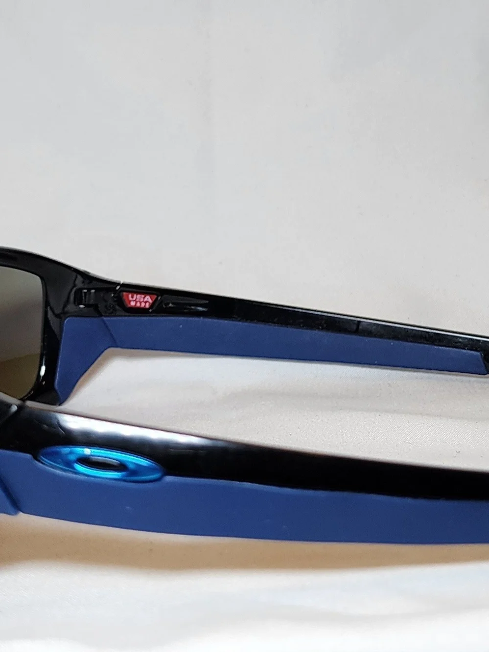 Oakley Black Sunglasses with Blue-Purple Mirrored Lenses